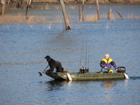 Greg and his Fish Guide: Out and About on St. Croix River Photos by Karen Schulz